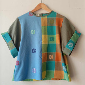 MASIGLA: MIX LIGHT BLUE FLOWERS / GLENDA W/ MOSS GREEN LINEN SLEEVES