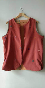 REVERSIBLE VEST